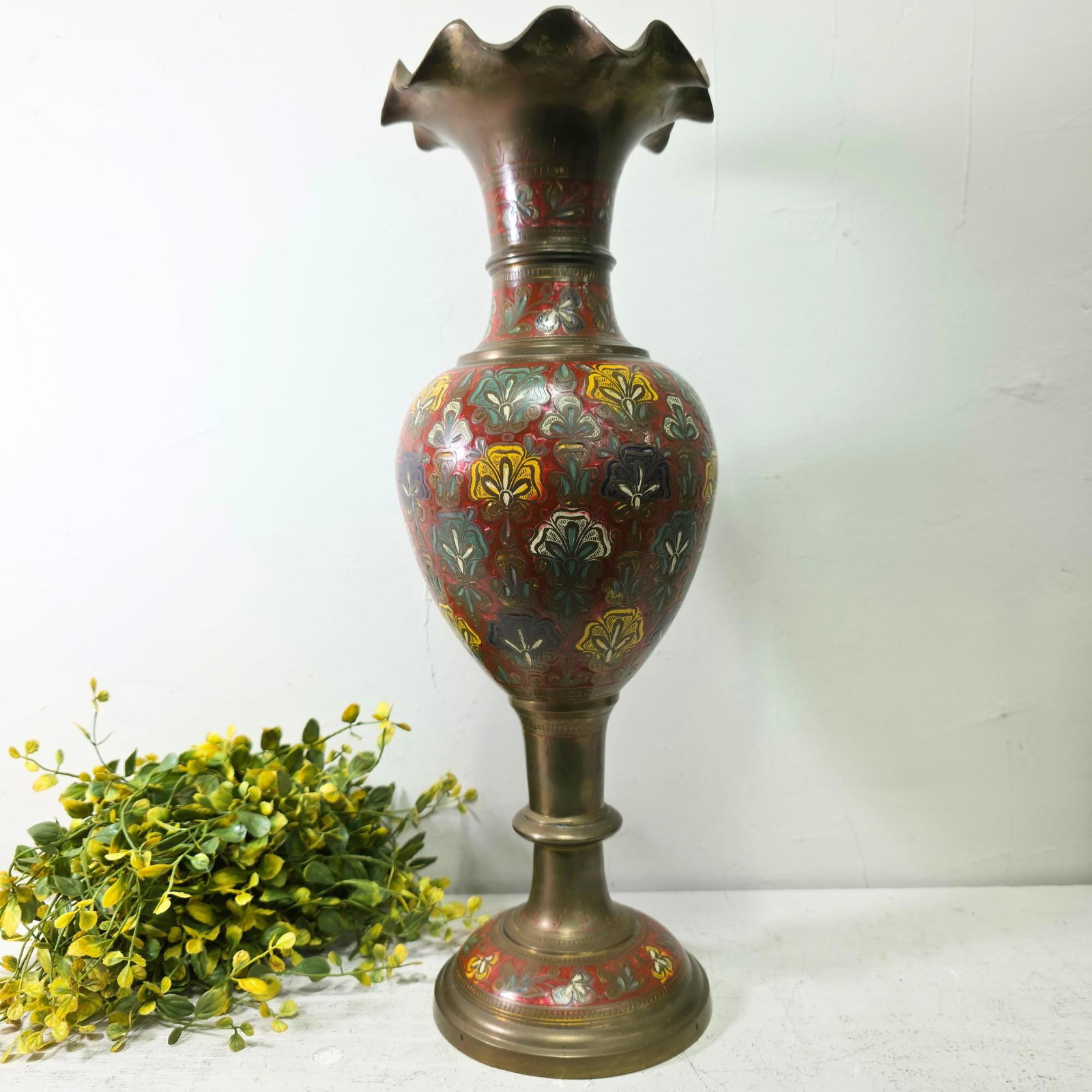 Brass Large Vase Scalloped Floral Etched MCM Pedestal Decor: A tall, vintage brass pedestal vase with etched floral panels and rich red painted accents, finished with a dramatic scalloped rim—an instant statement for boho, eclectic, and MCM-inspired