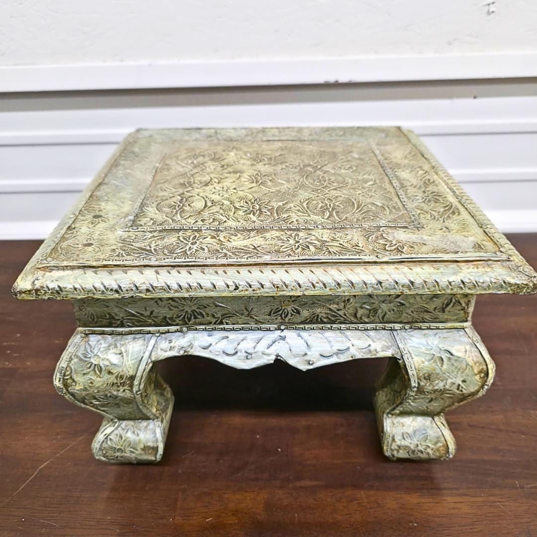 Vintage Brass Embossed Plant Stand, Indian Bajot Table, Floral Repoussé, 12": Vintage made in India brass embossed plant stand in Indian bajot style embossed low stand / pedestal with floral repoussé-style panels and a brass-clad look over a wood core. Perfect as a plant s