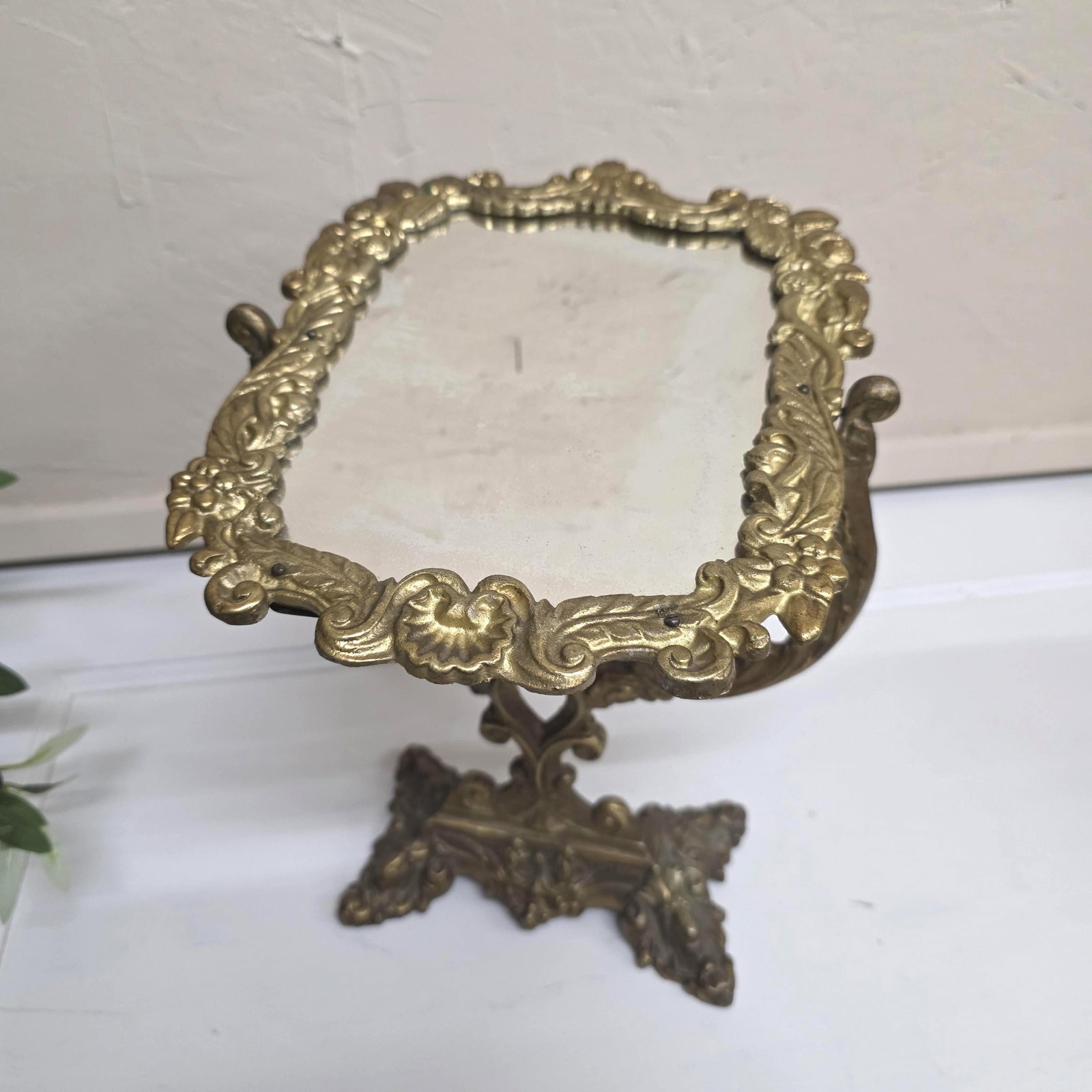 Victorian Rococo Revival Cast Brass Vanity Mirror, Ornate Floral Frame, Hollywood Regency Decor: Solid cast brass Rococo Revival tabletop vanity mirror — 16.5” tall, tilts up/down and holds position. No installation. Free shipping + pro packing. What It Is A Victorian Rococo Revival s