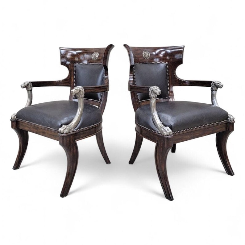 Vintage George IV English Regency Styled Leather Armchairs with Metal Lion Head Arms: Thank you Vintage George IV English Regency Styled Black Leather Armchairs with Metal Lion Head Arms and Saber Legs Heighten your living room decor with these ornamented black leather side chairs.