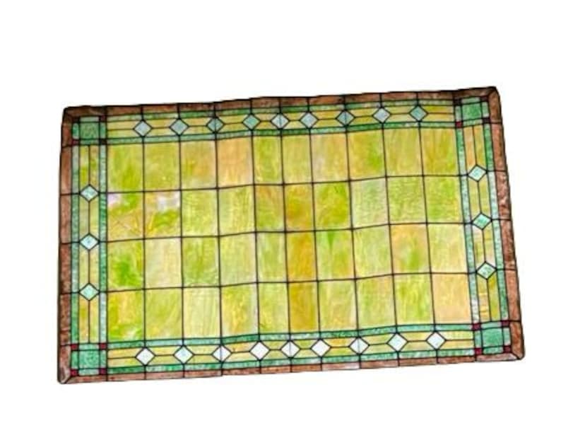 Antique Tiffany Style Salvaged Green Upper Transom Stained Glass Windows - Pair: Antique Tiffany Style Salvaged Chicago Church Green Upper Transom Stained Glass Windows - Pair Circa Early 1900’s Dimensions 5 Ft x 4 Ft ***Lower Stained Glass Windows Sold Separately