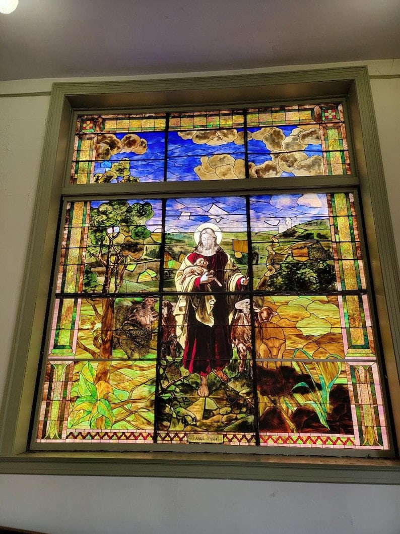 Antique Monumental Tiffany Style Good Sheppard Salvaged Stained Glass Window: Antique Monumental Tiffany Style 2 Section Good Sheppard Chicago Church Salvaged Stained Glass Window Circa Early 1900’s Dimensions 11 Ft x 14 Ft CONDITION: Please be aware that all items are