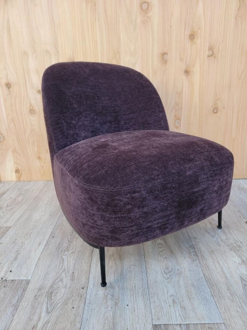 Sejour Lounge Chair By GamFratesi for Gubi: Italian Sejour Lounge Chair By GamFratesi for Gubi in a Purple Chenille with a Black Steel frame Neat, elegant and brimming with personality, the Sejour Lounge Chair is a fine blend of the new with