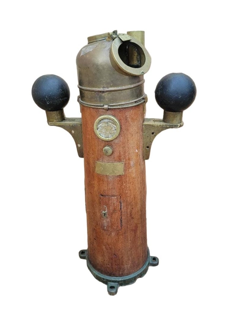 Antique Davies and Co Shopfitters Patt. 196 Yacht Binnacle and Compass: This antique binnacle No. 2647W has a small door on the front and back side. This rustic and eclectic piece would perfectly decorate your nautical-themed restaurant or beach house. Circa Early 20th