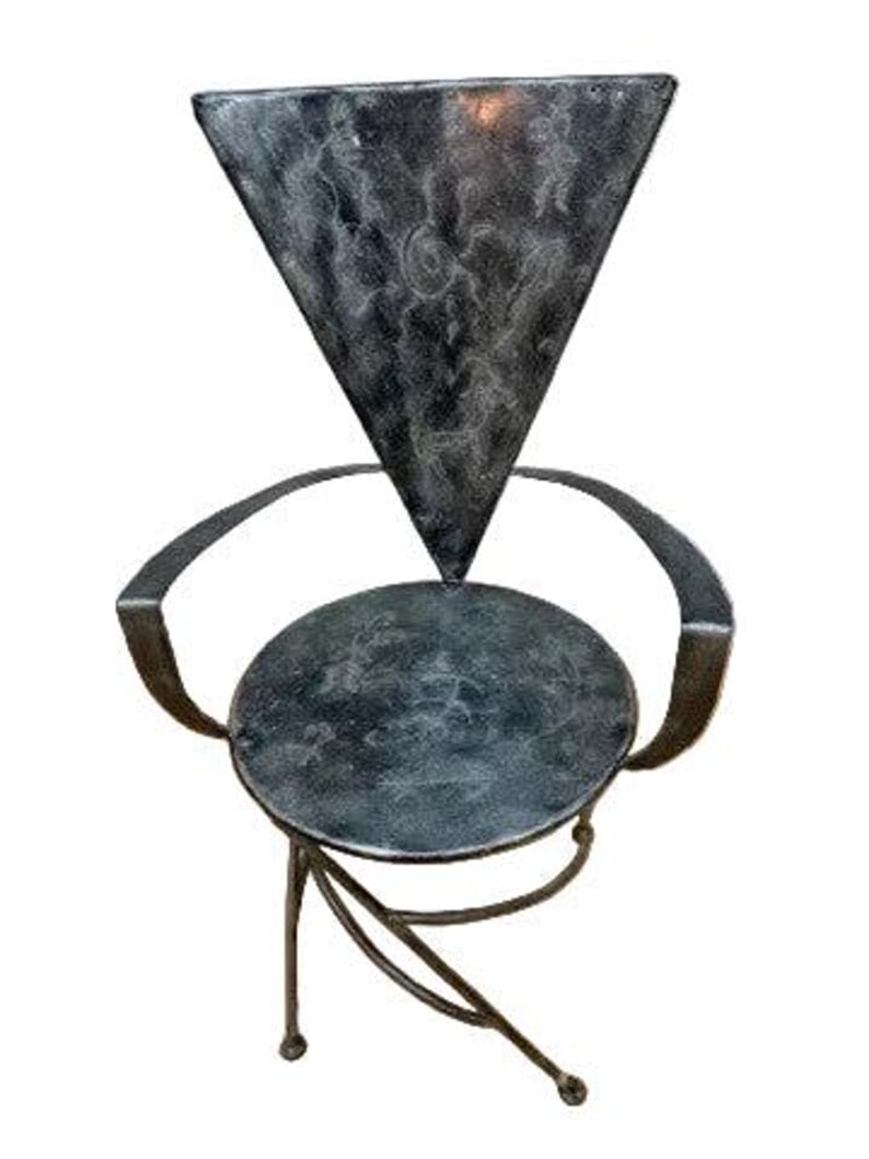 Vintage Metal Side Chair with Triangle Back and Round Seat: Thank you Vintage Metal Side Chair with Triangle Back and Round Seat Accent your living room with a triangle chair back marbled metal arm chair. The bold geometric shapes will give your space postmode
