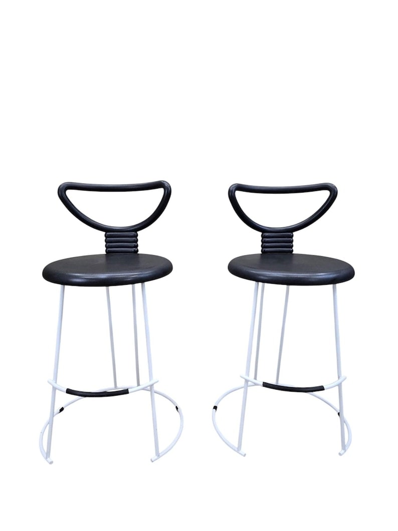MCM Nardis Stool by Nobu by Fasem - Pair: Mid Century Modern Nardis Black Stool by Nobu Tanigawa for Fasem - Pair This table features an elegantly slender steel tube base has a bright, mirror-like finish. The hidden steel structure of the