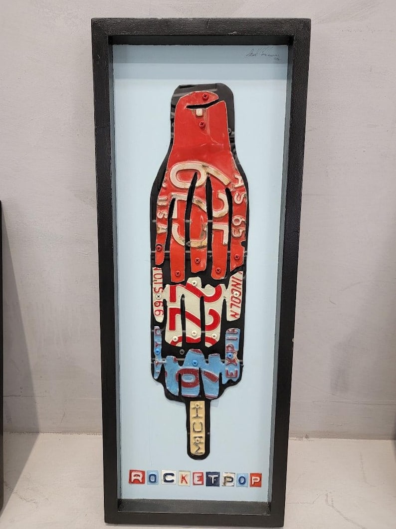 Artist Derek Christensen Original License Plate Popscicle Pop Art, Wall Art Signed: Artist Derek Christensen Original License Plate Popscicle Pop Art, Wall Art Signed Derek Christensen, an award winning artist from Chicago, is known for his hand-made metal work and found objects to