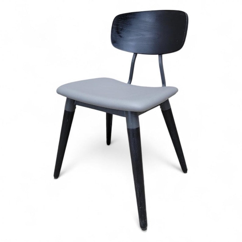 Modern Copine Side Chair by Design Form: Modern Style Copine Side Chair with Upholstered Seat by Design Form Furnishings Steel frame construction featuring a fully wrapped upholstered seat with a wood veneer seat back and solid wood legs ***