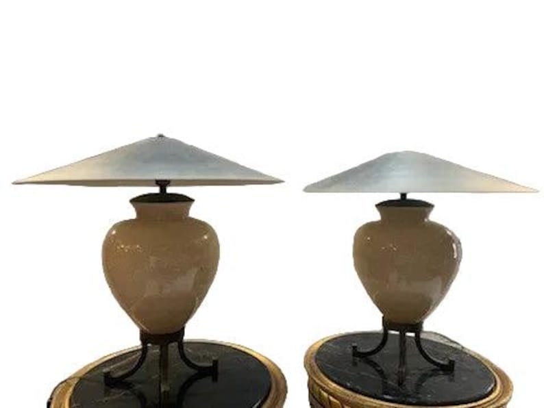 Vintage Karl Springer Style Ceramic Table Lamps With Metal Shades - Pair: Thank you Vintage Karl Springer Style Ceramic Table Lamps With Metal Shades on Metal Base - Pair Light your space with this pair of metallic flying saucer lamps. Each lamp sits on a bronze pedestal wi