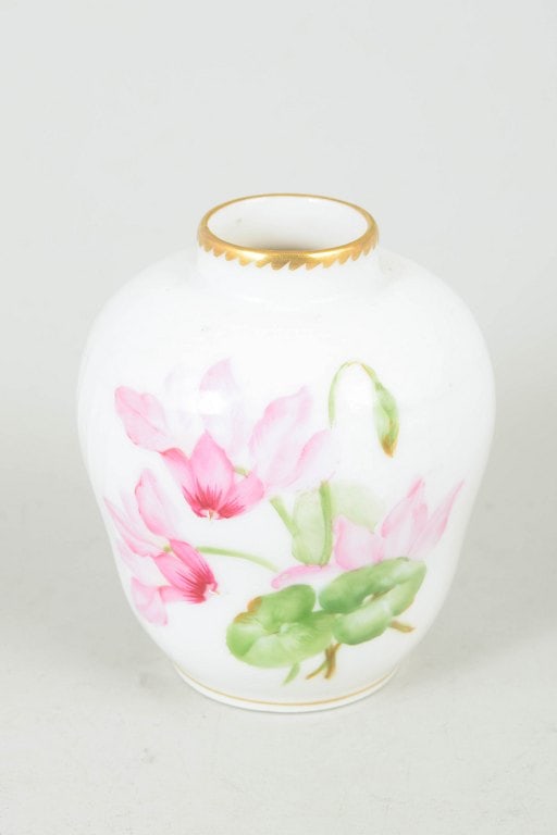 Royal Copenhagen, Denmark. Saxon flower, porcelain vase with gilded rim. Circa 1900.: Royal Copenhagen Saxon flower, vase. Hand-painted porcelain vase decorated with Saxon flower motif on white glaze, finished with gilded rim at the neck and foot. 1st factory quality. Origin: Denmark. 