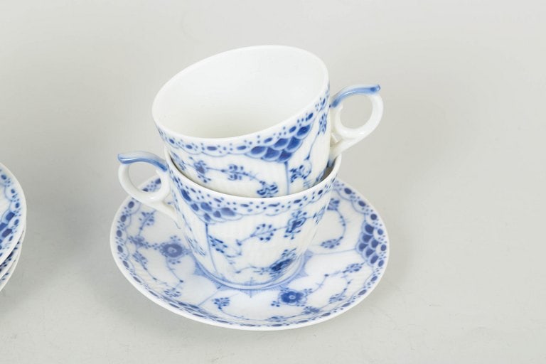 Royal Copenhagen, Denmark. Blue Fluted Half Lace, set of four coffee cups with saucers. Approx. - 3