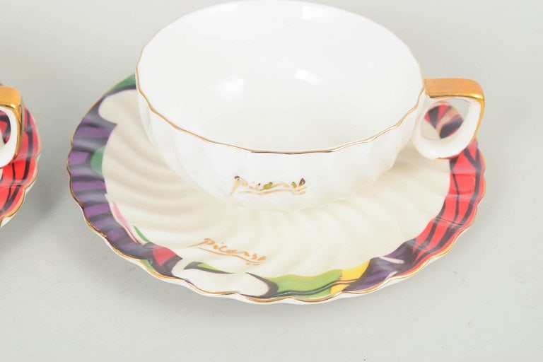Europe. Set of two large teacups with matching saucers with multicoloured decoration, marked - 3