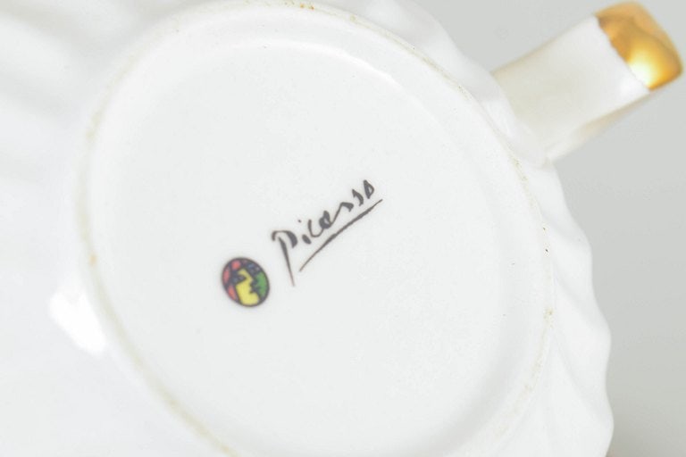 Europe. Set of two large teacups with matching saucers with multicoloured decoration, marked - 4