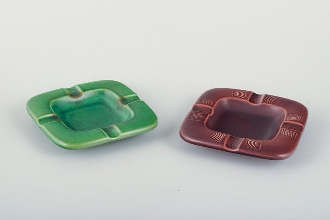 Aluminia, Denmark. Two square ceramic ashtrays. Mid-20th century. (1 of 4)
