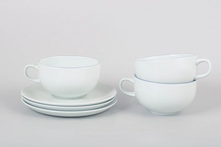 Grethe Meyer for Royal Copenhagen, Denmark. Set of three Blue Line porcelain teacups with matching (1 of 4)