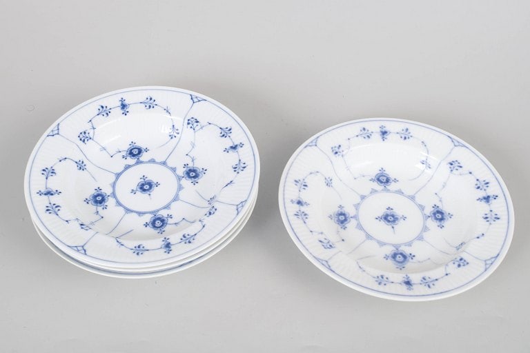 Royal Copenhagen, Denmark. Blue Fluted Plain set of four porcelain deep plates. Approx. 1920s. - 2