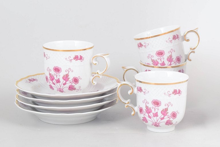 Set of four Hollóháza, Hungary. Porcelain coffee cups with saucers with pink floral (1 of 4)