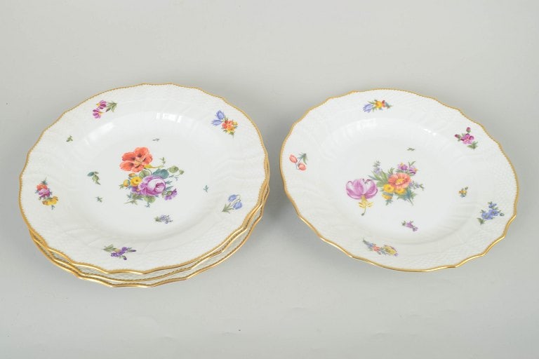 Royal Copenhagen, Denmark. Saxon flower, set of four porcelain dinner plates with floral motifs and - 2