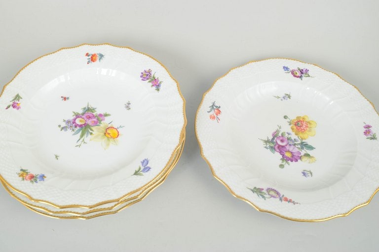 Royal Copenhagen, Denmark. Saxon flower, set of four porcelain dinner plates with floral motifs and - 2