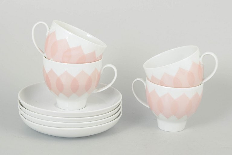 Bjørn Wiinblad for Rosenthal, Germany. Porcelain set of four coffee cups with matching saucers: Bjørn Wiinblad for Rosenthal, set of four coffee cups with matching saucers. Set consisting of four coffee cups with matching saucers in porcelain featuring the pink "Lotus" pattern, define