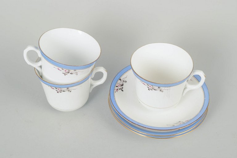 Carlstad, Europe. Porcelain set of three large coffee cups with matching saucers with blue rim and - 2