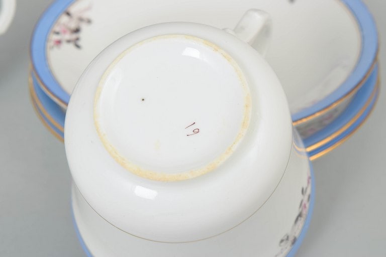 Carlstad, Europe. Porcelain set of three large coffee cups with matching saucers with blue rim and - 4