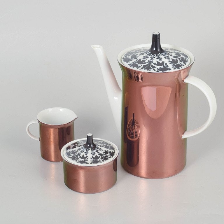 Bjørn Wiinblad for Rosenthal, Germany. Porcelain coffee pot with creamer and sugar bowl with: Bjørn Wiinblad for Rosenthal, coffee pot with creamer and sugar bowl. Coffee set from the Hilton series consisting of a coffee pot, creamer and sugar bowl in porcelain, executed in a characterist