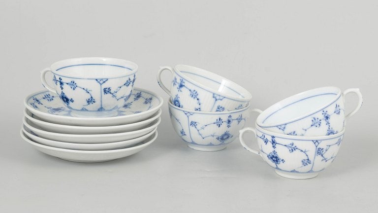 Royal Copenhagen, Denmark. Blue Fluted Plain, set of five porcelain coffee cups with matching: Royal Copenhagen Blue Fluted Plain, set of five coffee cups with matching saucers. Classic set of five coffee cups with matching saucers from Royal Copenhagen's Blue Fluted Plain service, model 1/465,