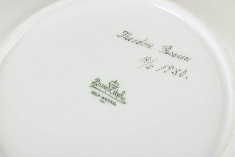 Rosenthal, Germany. Porcelain set of twelve plates with polychrome floral decoration and gilded rim. - 4