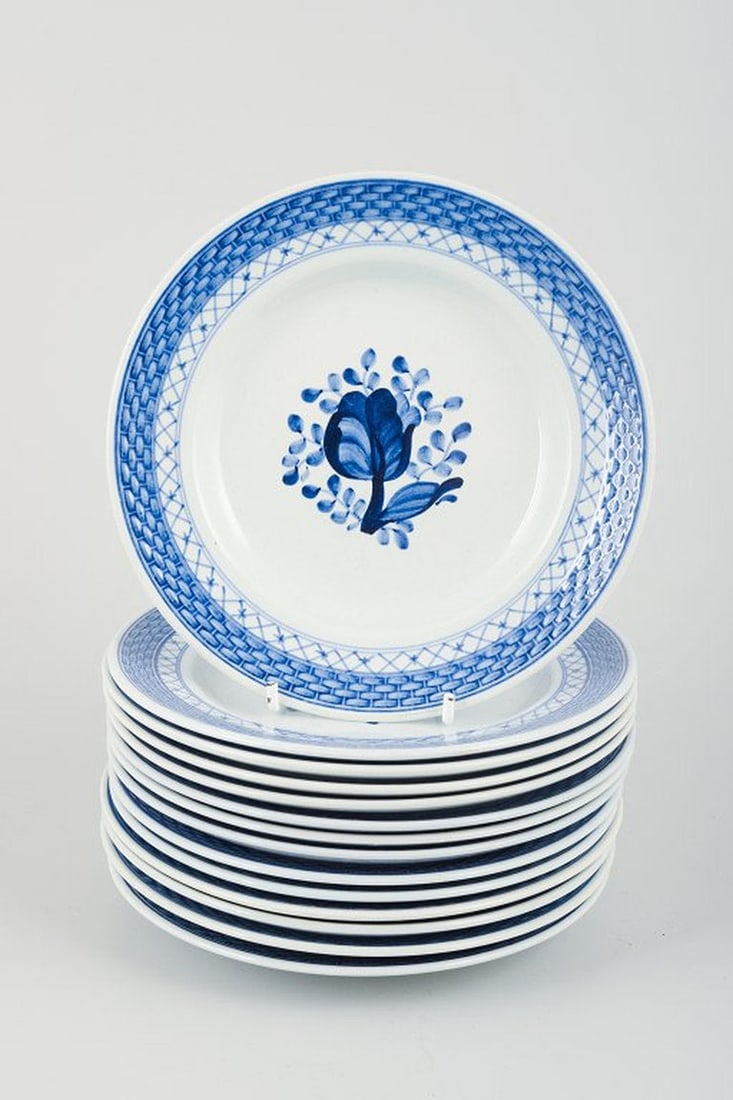 Christian Joachim for Aluminia, Denmark. Tranquebar. 14 light blue faience plates with dark blue (1 of 4)