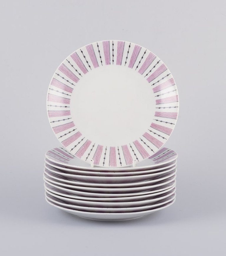 Gunnar Nylund for Rörstrand, Sweden. A set of eleven 'Casino' dessert plates. Mid-20th century. (1 of 4)