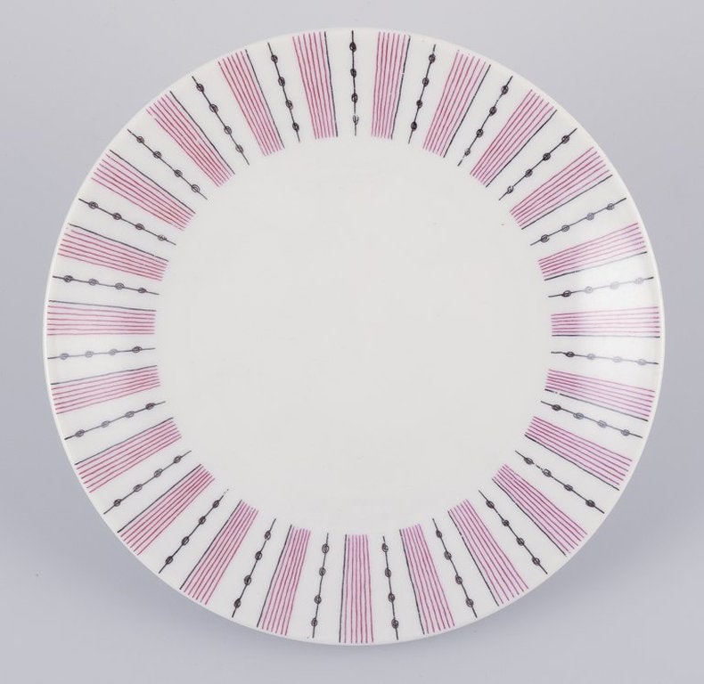 Gunnar Nylund for Rörstrand, Sweden. A set of eleven 'Casino' dessert plates. Mid-20th century. - 2