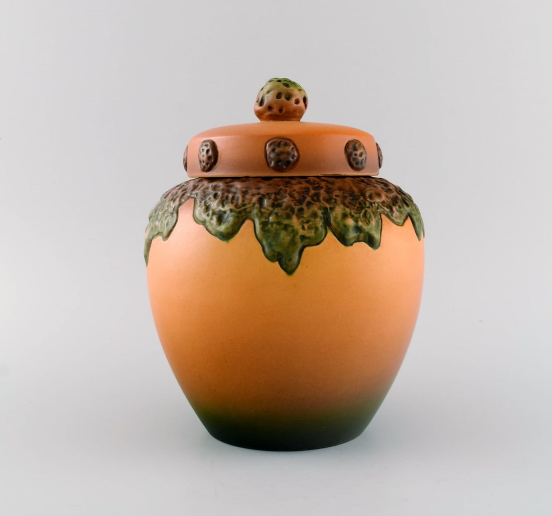 Ipsen's, Denmark. Lidded vase in hand-painted and glazed ceramics. 1920s / 30s. Model number 784.: Ipsen's, Denmark. Lidded vase in hand-painted and glazed ceramics. 1920s / 30s. Model number 784. Measures: 22 x 17 cm. In excellent condition. Stamped. Reserve: $210.00 Shipping: Domestic: Shipping r