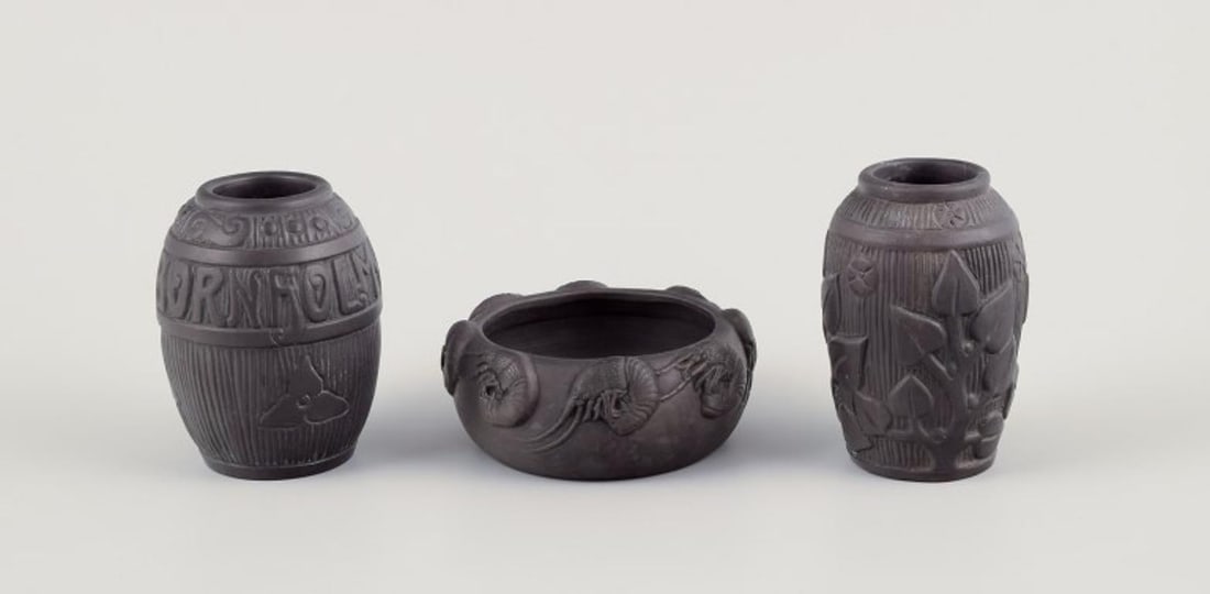 Hjorth, Bornholm. Two beautiful vases and a bowl in black terracotta. Early 1900s.: Hjorth, Bornholm. Two beautiful vases and a bowl in black terracotta. Early 1900s. Bowl with shrimp motif. All three pieces are marked. In excellent condition with minimal signs of use. Dimensions lar