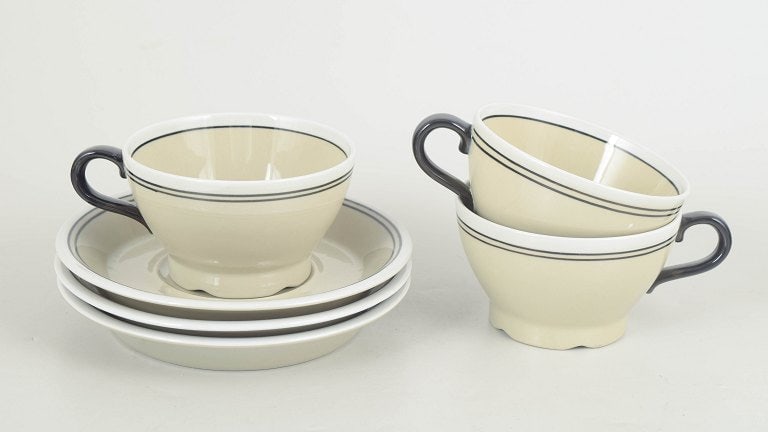 Jackie Lynd for Rörstrand, Sweden. Set of three faience teacups with matching saucers â (1 of 4)