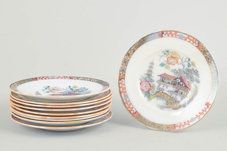 Rörstrand Japan series, Sweden. Set of ten faience flat plates with oriental-inspired: Rörstrand Japan series, set of ten flat plates. Flat plates in faience with oriental-inspired decoration in polychrome colours and finely detailed painting in Japanese style, characteristic of R&