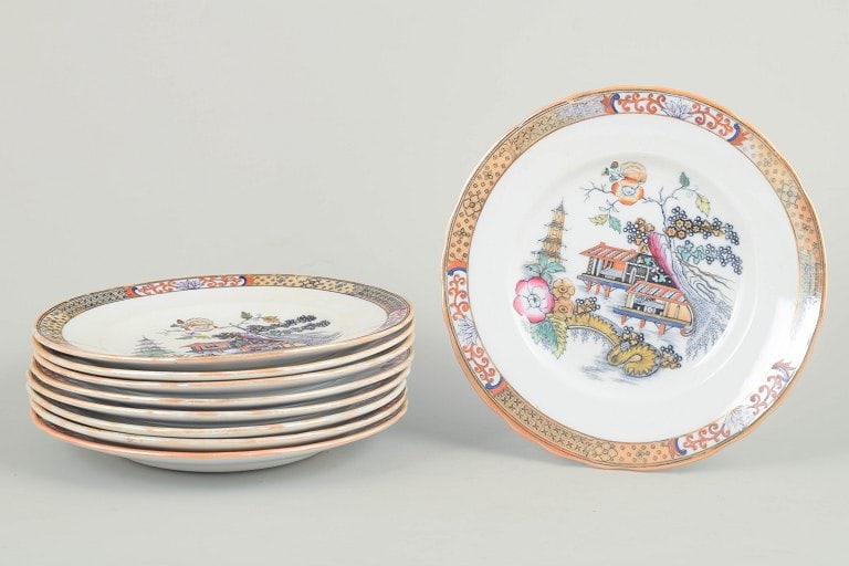 Rörstrand Japan series, Sweden. Set of nine faience lunch plates with oriental-inspired (1 of 4)