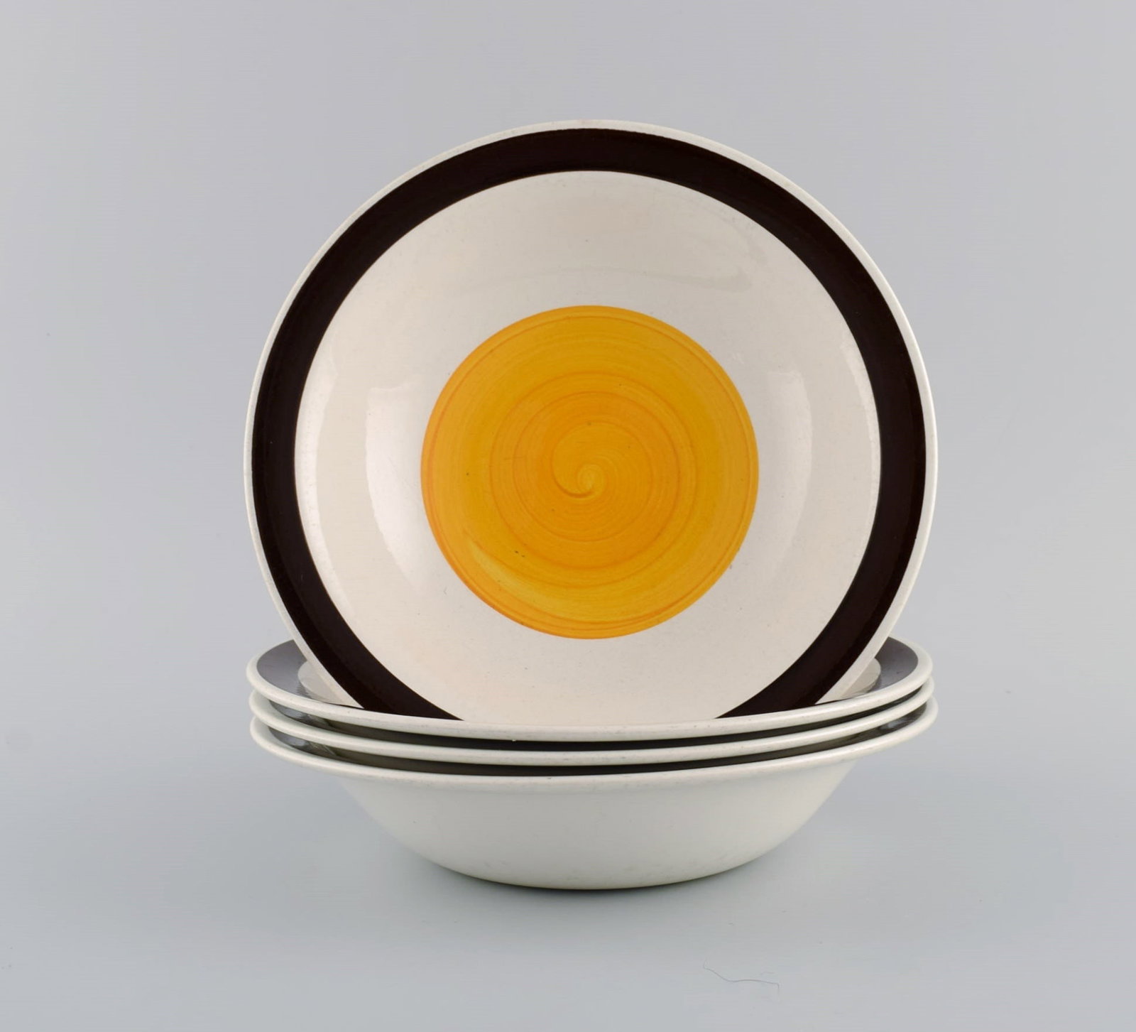 Carl Harry Stålhane (1920-1990) for Rörstrand. Four deep Solöga plates in: Carl Harry Stålhane (1920-1990) for Rörstrand. Four deep Solöga plates in hand-painted and glazed stoneware. 1960s / 70s. Measures: 20.5 x 4.5 cm. In excellent condition. Stamped.