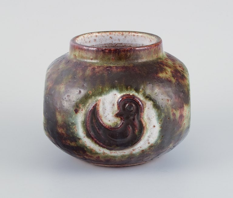Danish ceramicist, unique vase decorated with a baby bird.: Danish ceramicist, unique vase decorated with a baby bird. White, green, and brown shades. 1960s. In excellent condition. Marked. Dimensions: H 13.5 cm x D 14.0 cm. Reserve: $168.00 Shipping: