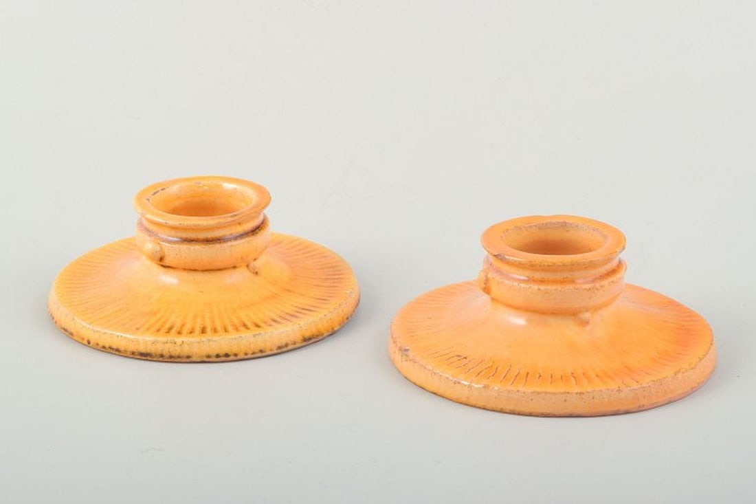 Svend Hammershøi for Kähler, Denmark. Two low, round ceramic candlesticks with broad bases (1 of 4)