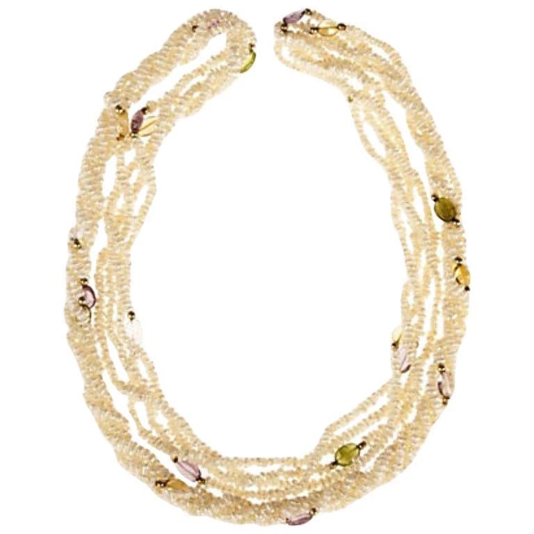 14 Karat Gold Gemstone Freshwater Pearl Torsade: Title:14 Karat Gold Gemstone Freshwater Pearl Torsade Description:Handmade necklace featuring freshwater pearl, citrine, amethyst, peridot, aquamarine, and 14 karat gold beads. Dates from 1960's.