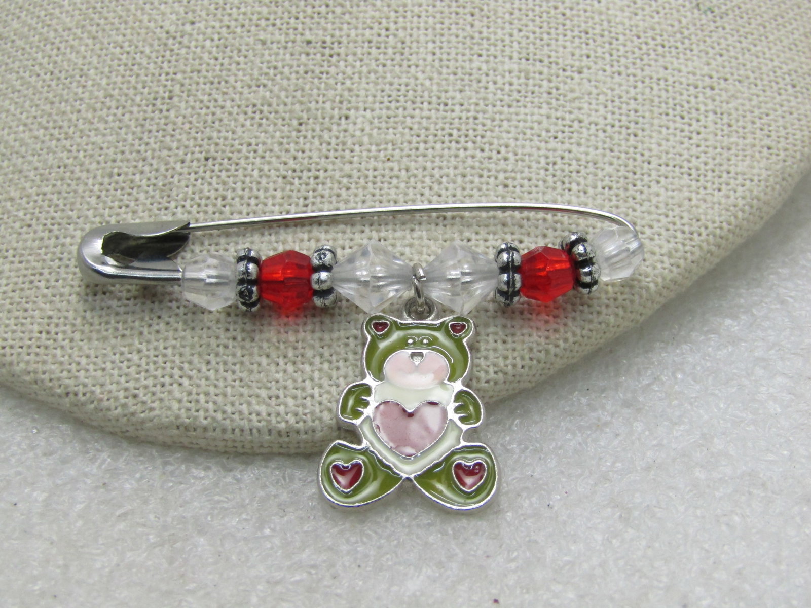 Vintage Enameled Beaded Bear Brooch/Pin, 2.25" Wide.: Title: Vintage Enameled Beaded Bear Brooch/Pin, 2.25" Wide. Description: Vintage Enameled Beaded Bear Brooch/Pin, 2.25" Wide. Hand made pin froma large safety in with red and white faceted acrylic bea