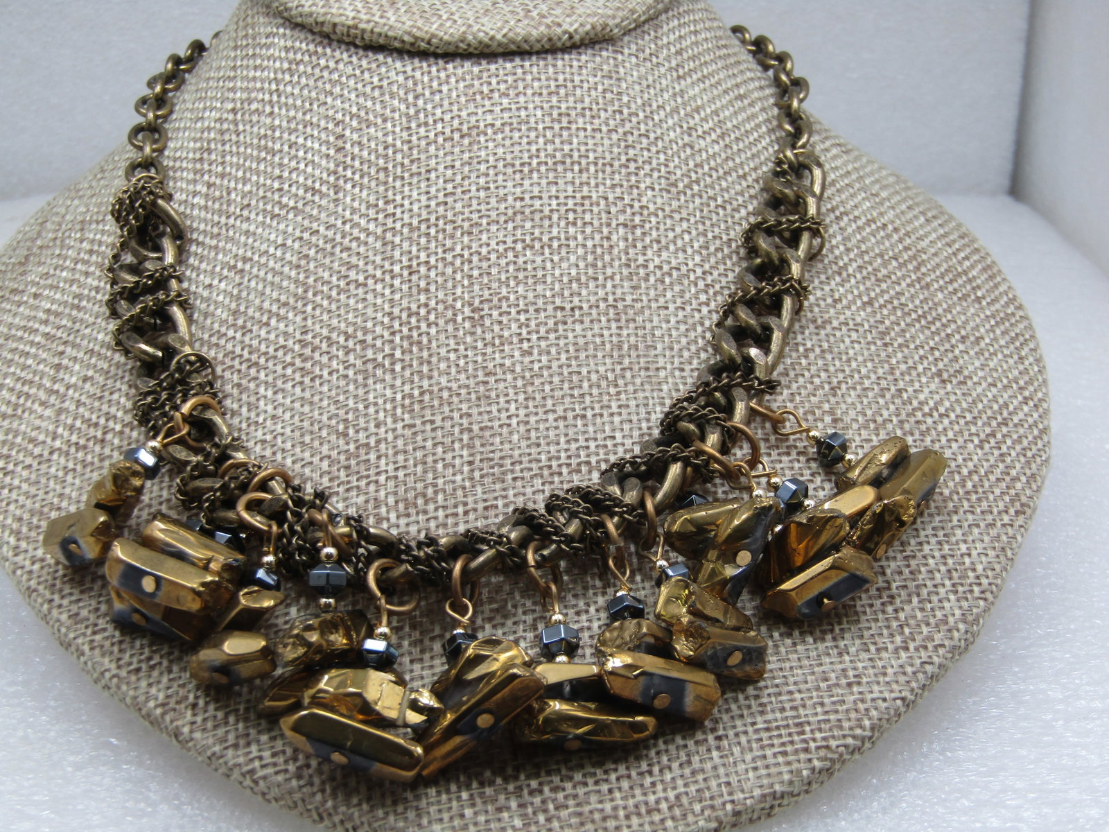 Vintage Gold Plate over Hematite Drop Necklace, 20": Title: Vintage Gold Plate over Hematite Drop Necklace, 20" Description: Vintage Gold Plated over Hematite Drop Necklace, 20". Heavy 10mm curb link main chain, wrapped with smaller curb link chain