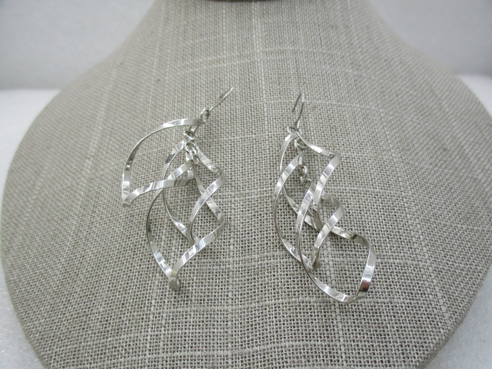 Spiral Drop Pierced Earrings, 1980's, 2.75": Title: Spiral Drop Pierced Earrings, 1980's, 2.75" Description: Spiral Drop Pierced Earrings, 1980's, 2.75" long and 3/4" wide. Three intertwinded spiral drops in slightly different lengths. Measured