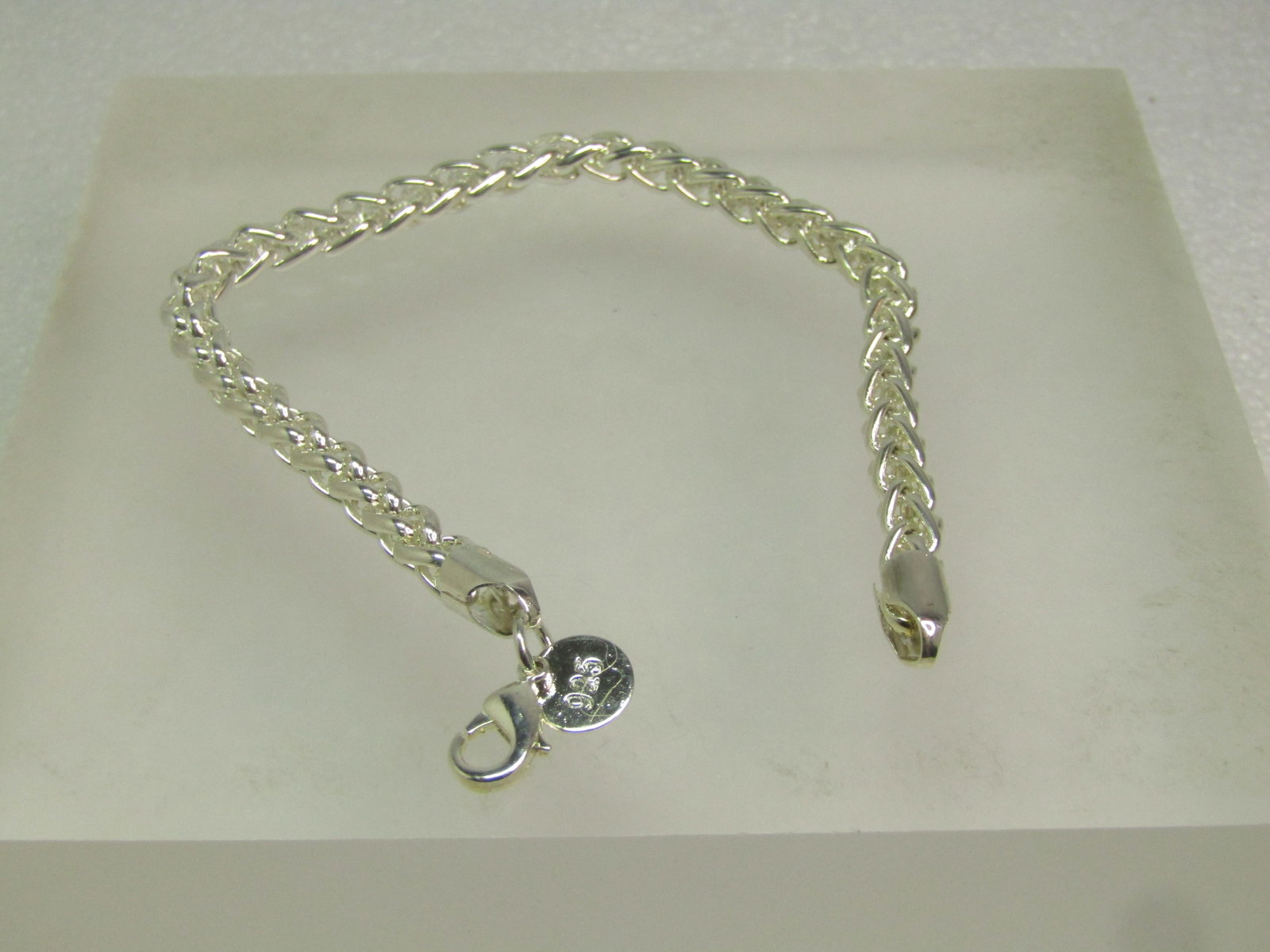 Silver Tone Foxtail Link Bracelet, 7.5", 4.5mm, 1990's-after: Title: Silver Tone Foxtail Link Bracelet, 7.5", 4.5mm, 1990's-after Description: Silver Tone Foxtail Link Bracelet, 7.5", 4.5mm, 1990's-after. It is marked .925 but it is not sterling. Silver plated w
