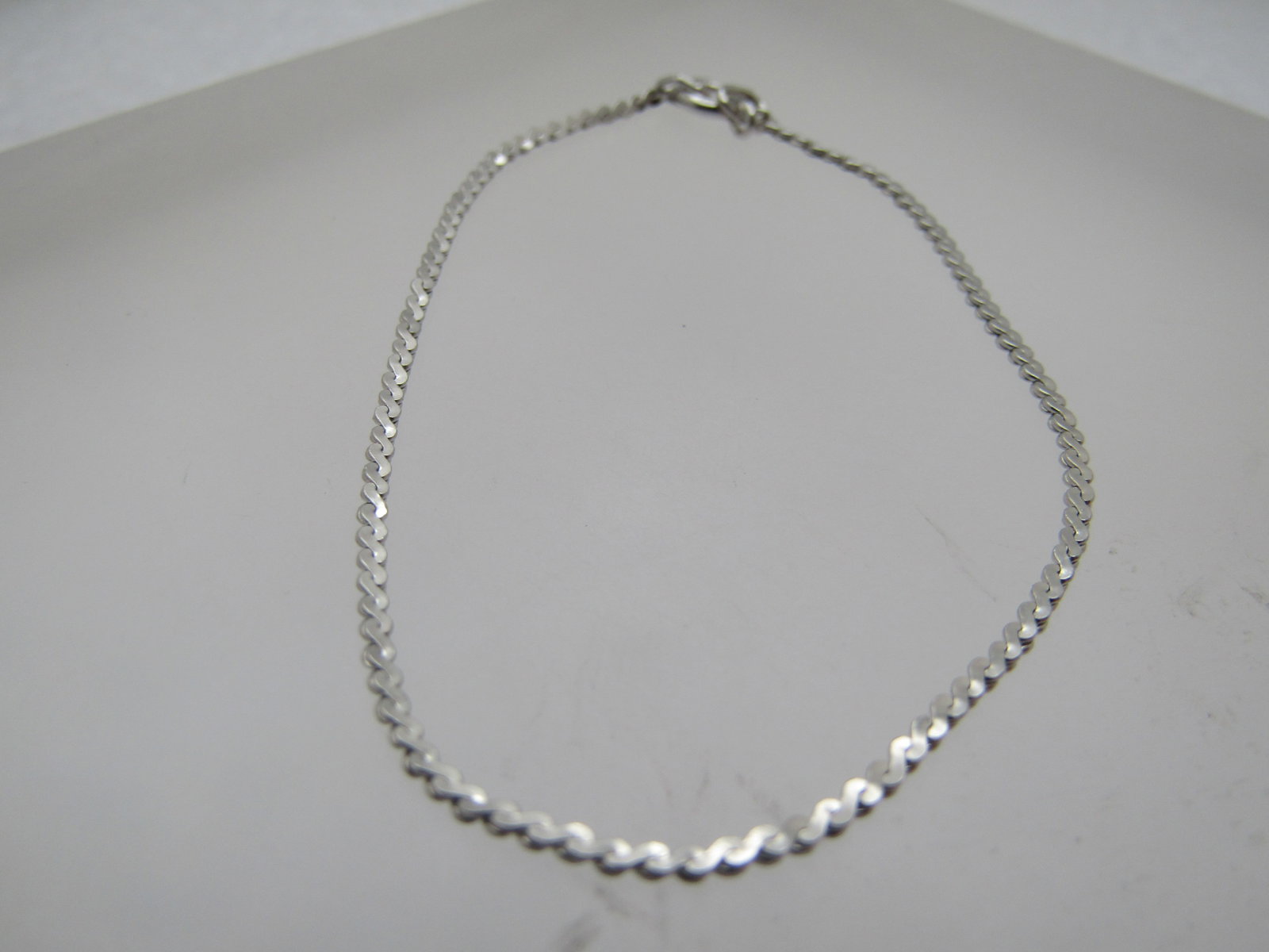 Herringbone Bracelet, 6.75" . 1/2mm, 1990's: Title: Herringbone Bracelet, 6.75" . 1/2mm, 1990's Description: Herringbone Bracelet, 6.75" . 1/2mm, 1990's. Marked sterling but does not test as sterling. It is in very good condition with spring