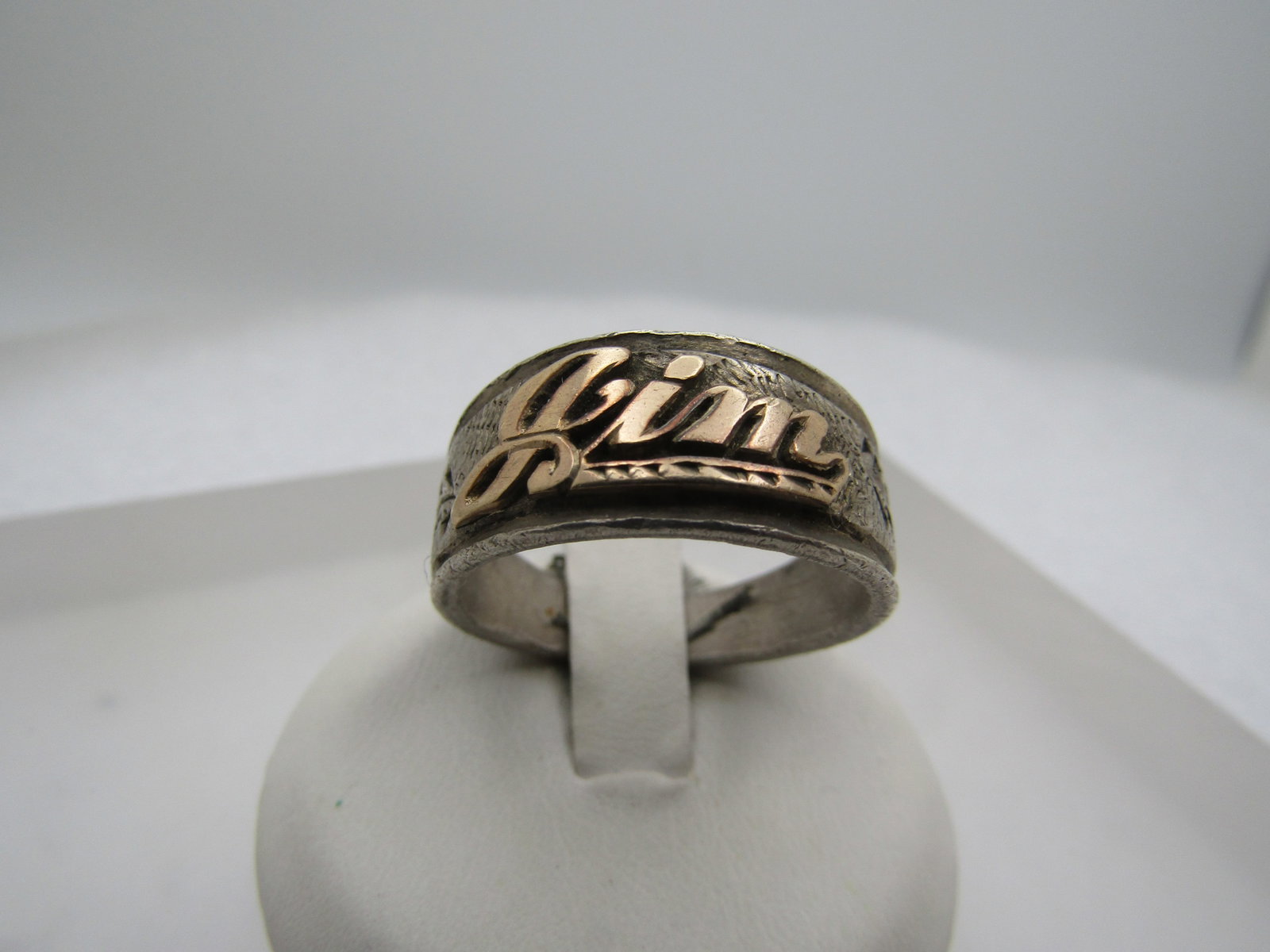 Vintage 10kt & Sterling JIM Name Ring, Sz. 11.: Title: Vintage 10kt & Sterling JIM Name Ring, Sz. 11. Description: Vintage 10kt & Sterling JIM Name Ring, Sz. 11. It is appx. 10mm at top center and 4mm at the back. It tests as sterling for the