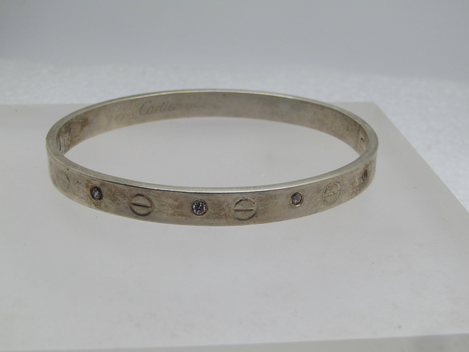 Silver Grommet & Rhinestone Hinged Bracelet, 7.25", 1990's or After, Signed: Title: Silver Grommet & Rhinestone Hinged Bracelet, 7.25", 1990's or After, Signed Description: Silver Grommet & Rhinestone Bracelet, 7.25", 1990's or After, Signed with the name of a high-end jeweler