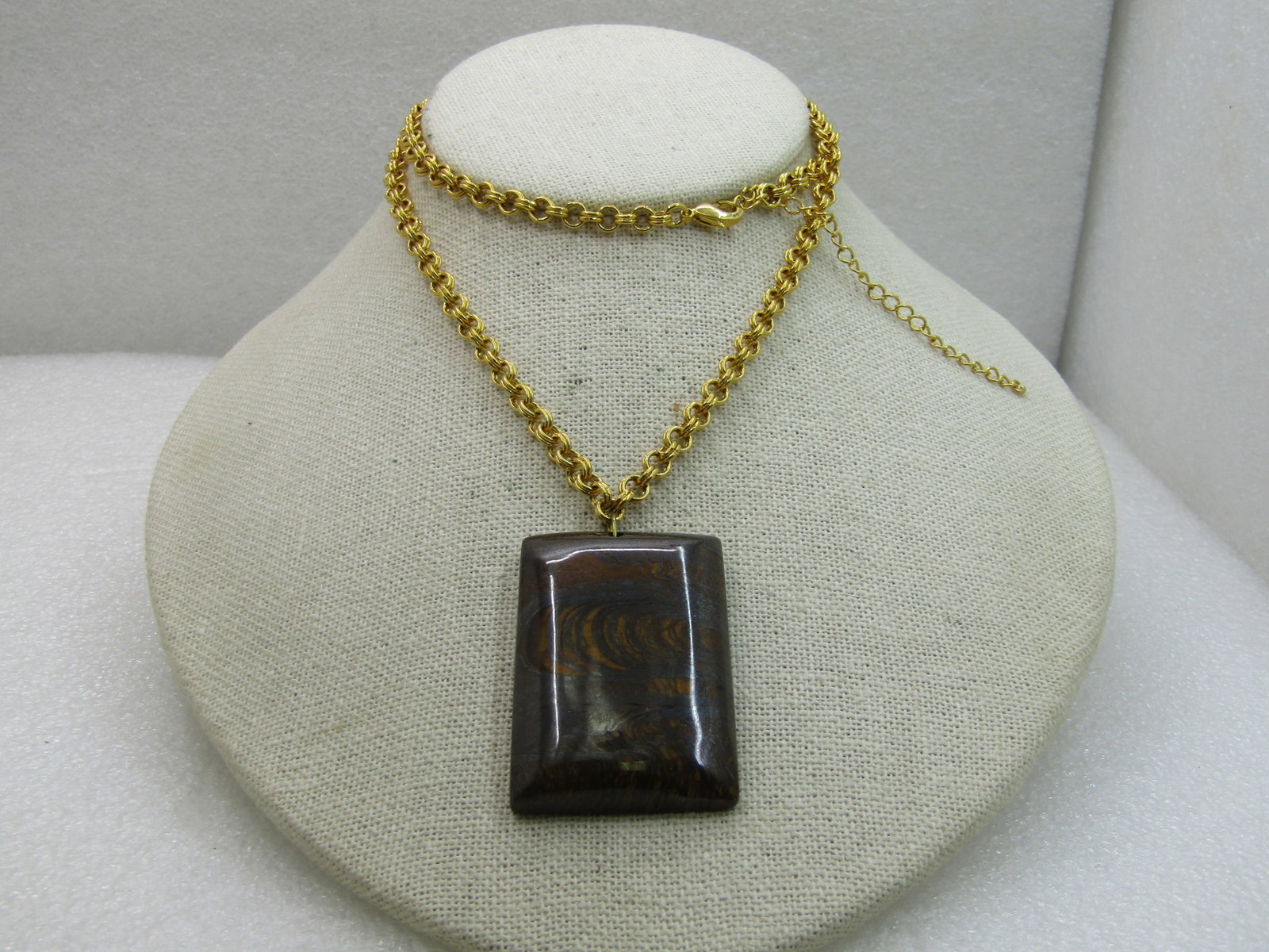 Tiger's Eye Necklace, Rectangular Pendant 24" Gold Tone Chain, Southwestern Vibe: Title: Tiger's Eye Necklace, Rectangular Pendant 24" Gold Tone Chain, Southwestern Vibe Description: Tiger's Eye Necklace, Rectangular Pendant, Southwestern Vibe, 24" Gold Tone Chain. The pendant is 1