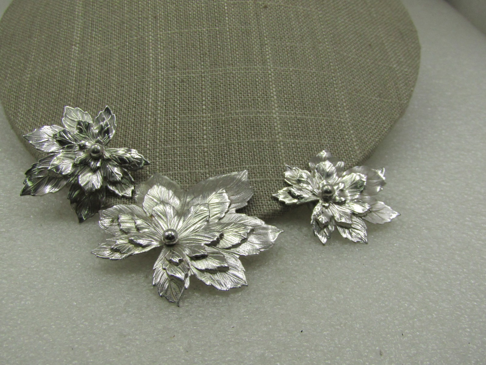 Vintage Tiered Leaf Brooch & Earrings Set, Signed SAC: Title: Vintage Tiered Leaf Brooch & Earrings Set, Signed SAC Description: Vintage Tiered Leaf Brooch & Earrings Set, Signed SAC for Sarah Coventry Silver tone with three tiers to the leaves. 1970's.